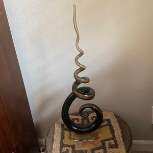 Beautiful blown glass art piece on glass vase